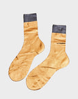 Maria La Rosa's bicolour metallic socks.